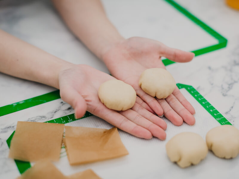 holding out fresh dough